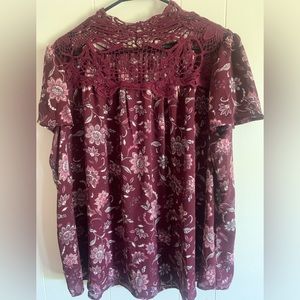 Lane Bryant size 18/20 Burgundy Floral blouse with crochet neck area. Never worn